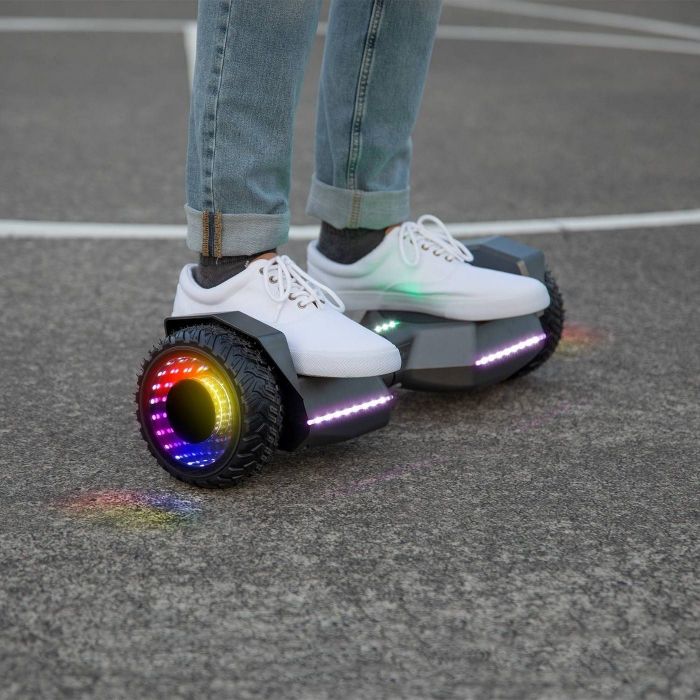 Feet on a light-up hoverboard