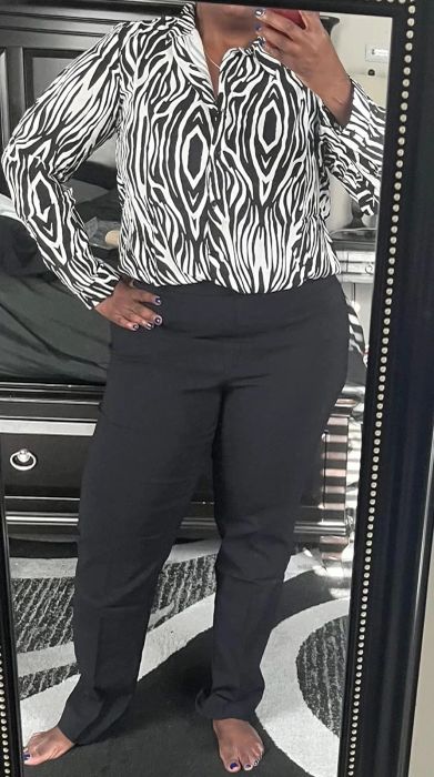 a reviewer showcasing the pants in black