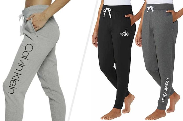 Two photos of models wearing joggers, one in gray and the other in black.