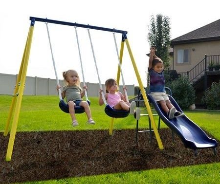 A yellow and blue outdoor playset with two swings and a slide