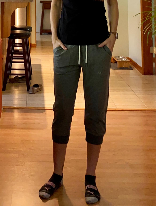 Image of a reviewer wearing green capris