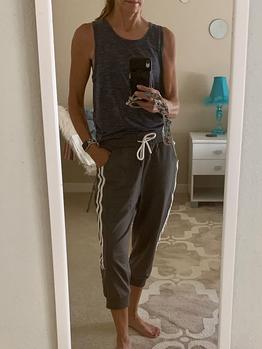 Image of a reviewer wearing black pants