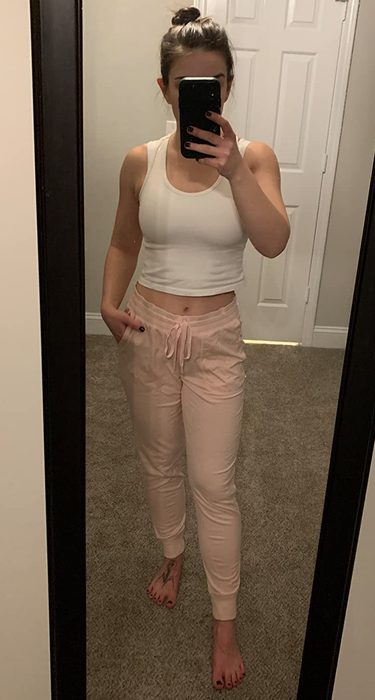 Image of a reviewer wearing light pink joggers