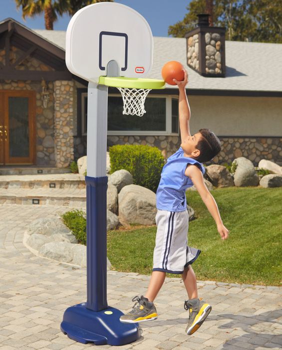 A sturdy plastic basketball hoop with an adjustable height feature to accommodate growing children