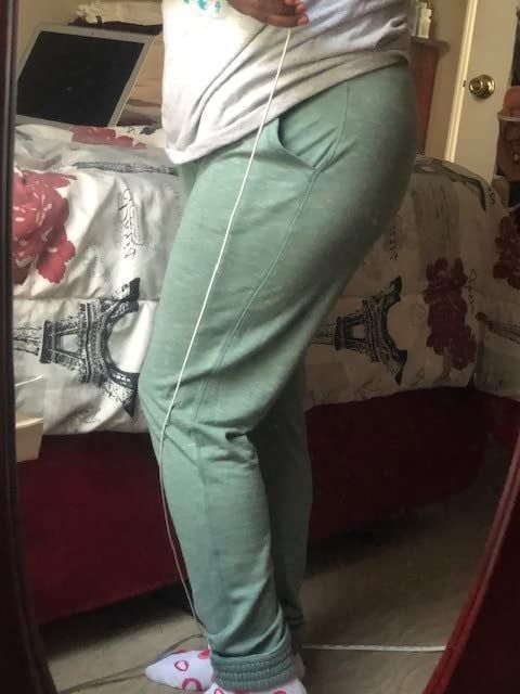 Image showing a reviewer in green pants