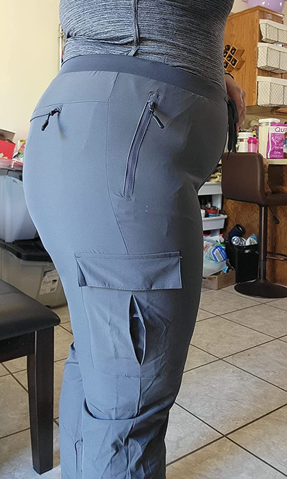 Another image of a reviewer in gray pants