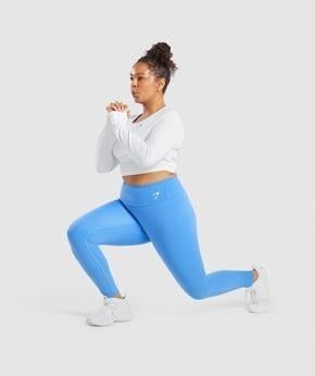 same model performing a lunge exercise