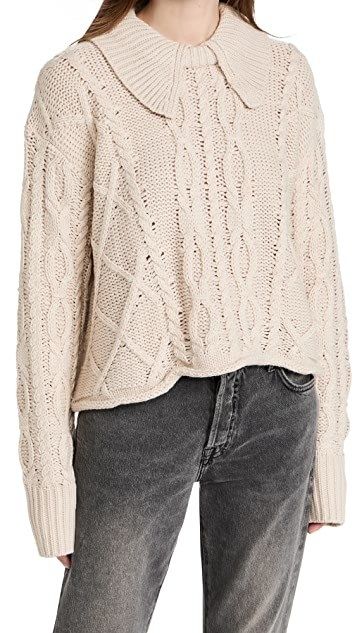 A model showcasing the sweater for the perfect look.