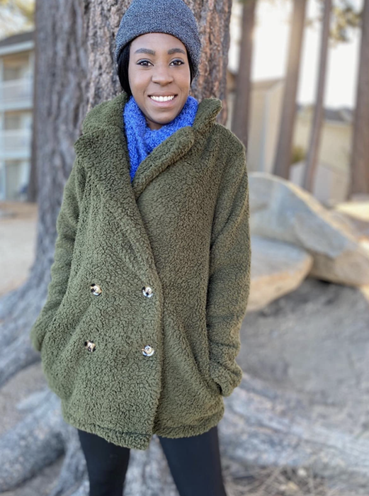 A customer photo of them sporting the green button-down version of the jacket.