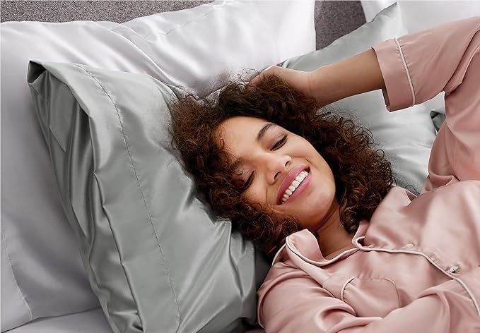 A model enjoying the grey pillowcase.