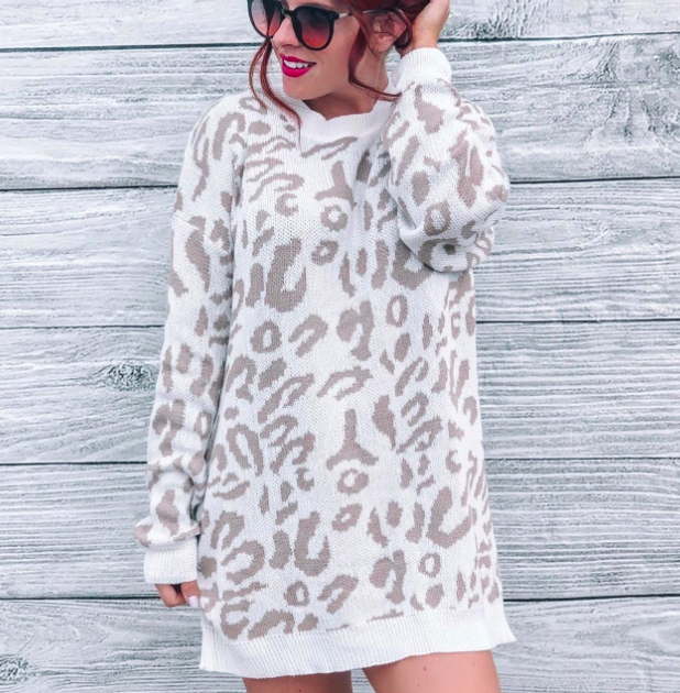 A model is pictured wearing the sweater dress.