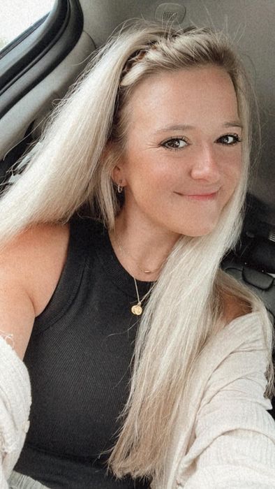 The reviewer modeling the headband.