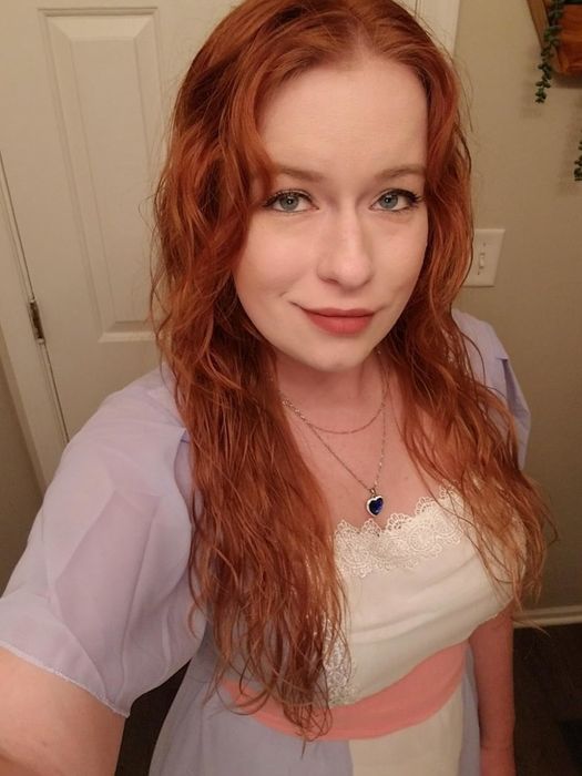 The reviewer's wavy hair after using the mousse.