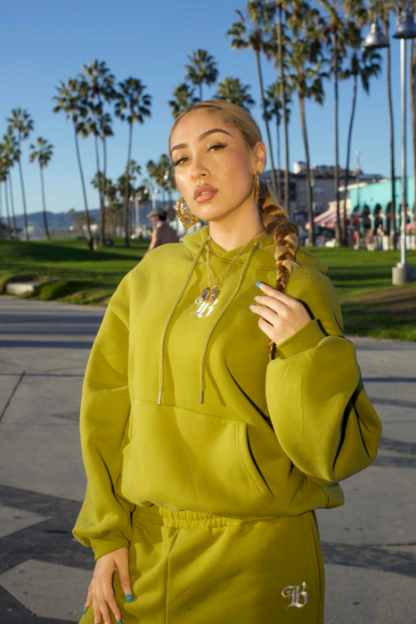 A model is dressed in a casual sweatshirt.