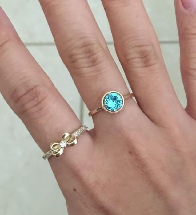 Customer photo of the same ring, but featuring a turquoise stone