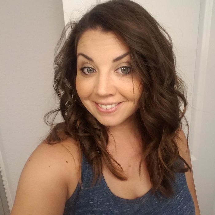 Final photo revealing the reviewer's beautifully curled hair