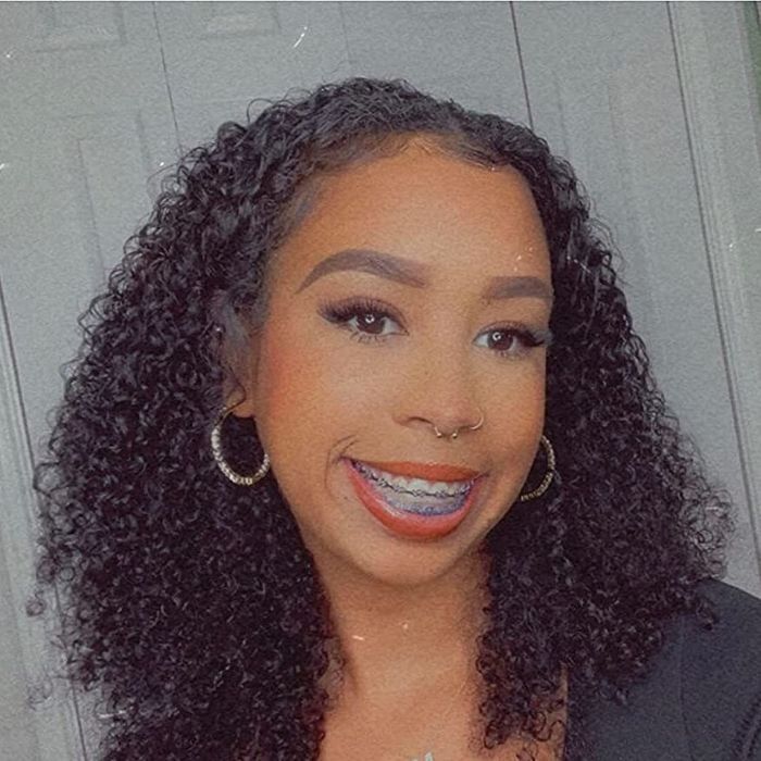 A second reviewer displaying her hair in a loose, down style