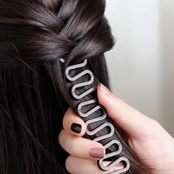 A model using the braiding tool to create a perfect, seamless braid