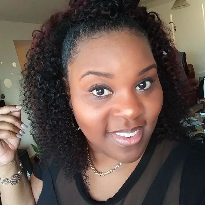 Reviewer showcasing a stylish half-up, half-down hairdo