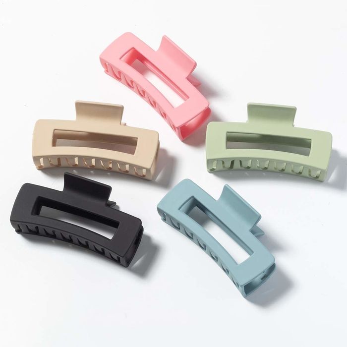 A set of five square matte claw clips in colors: pink, beige, black, blue, and green.