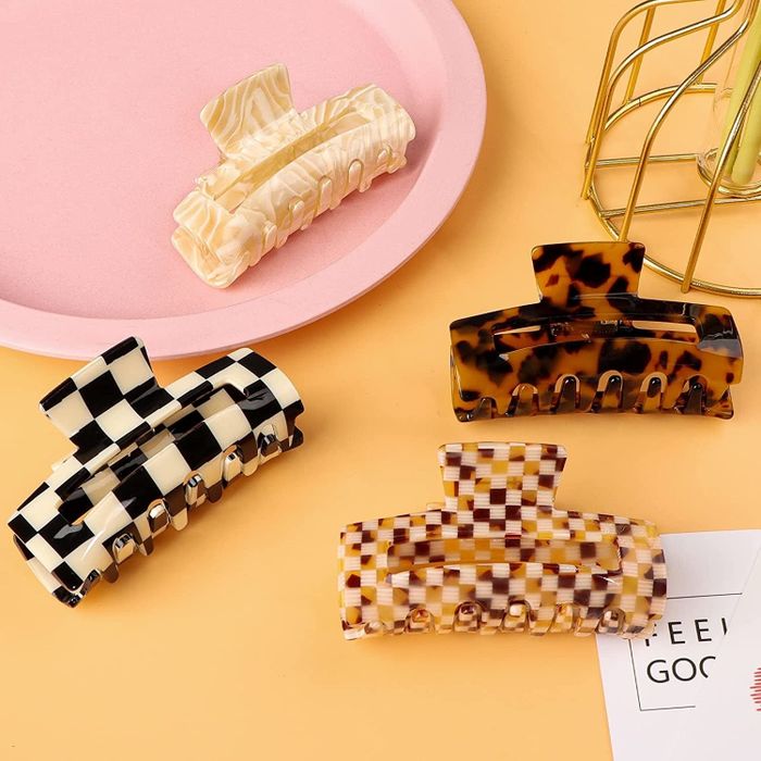 Four claw clips in checkerboard and tortoiseshell patterns