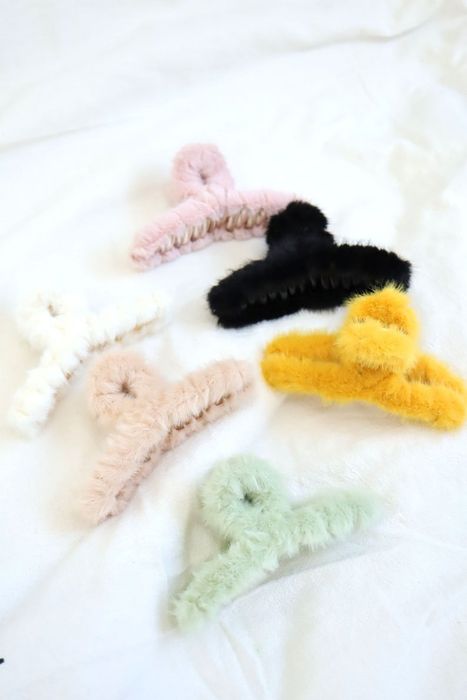 Product image showcasing five teddy hair clips in various colors.
