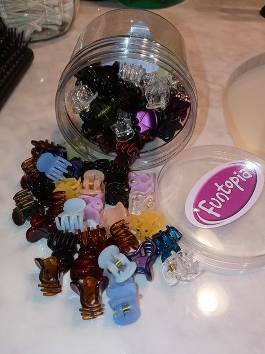 Reviewer photo featuring the mini claw clip set spilling out of its container