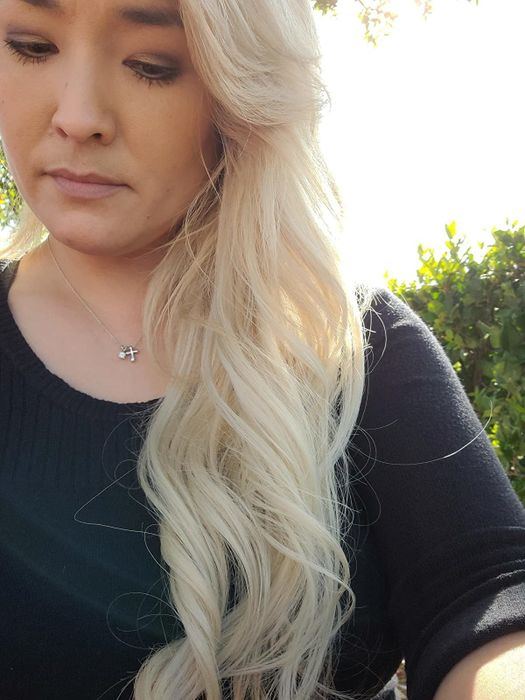 the reviewer's soft and smooth platinum blonde hair