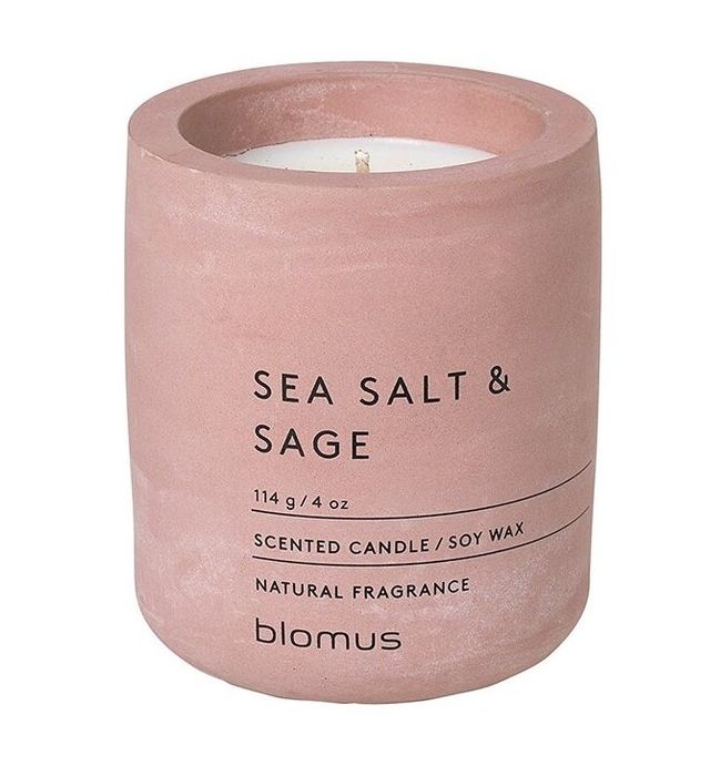 a candle infused with the calming scents of pink sea salt and sage