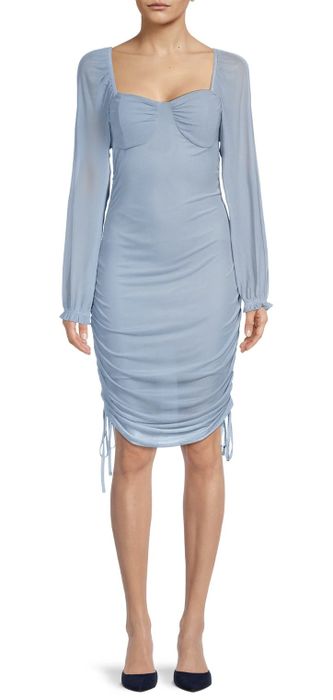 The dress in dusty blue.