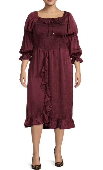 A model wearing the elegant burgundy dress.