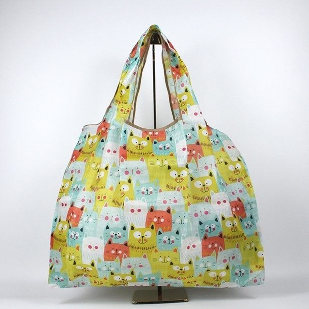 Packaging for Pioneer Woman reusable bag featuring a blue floral design.