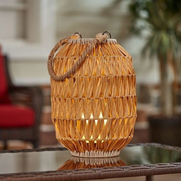 A rattan, oval-shaped lantern.
