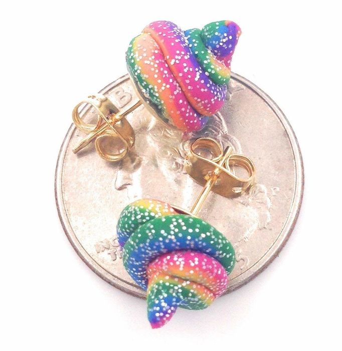 The earrings, the size of a penny, designed to look like a pile of rainbow poop with glitter
