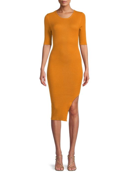 A model wearing a yellow dress and snake print shoes.