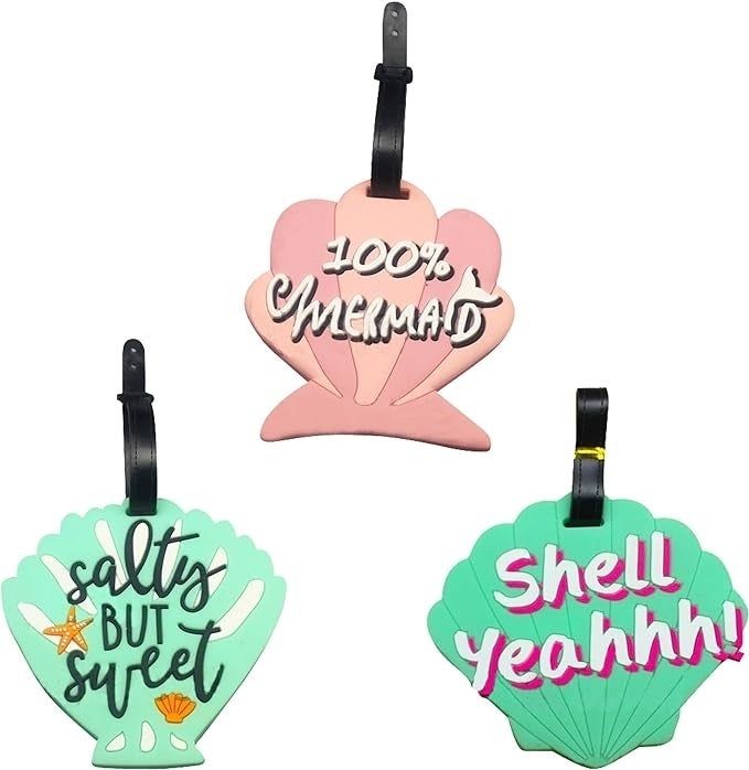 Three luggage tags designed in the shape of seashells