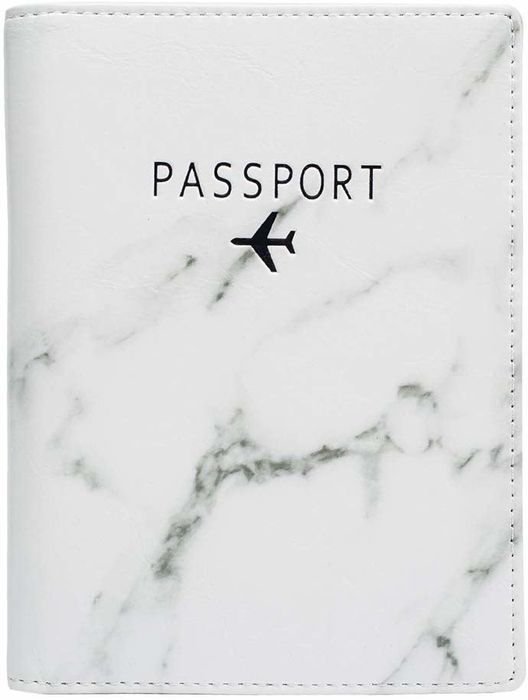 The passport holder has a sleek white and gray marble design with a plane silhouette and the word 