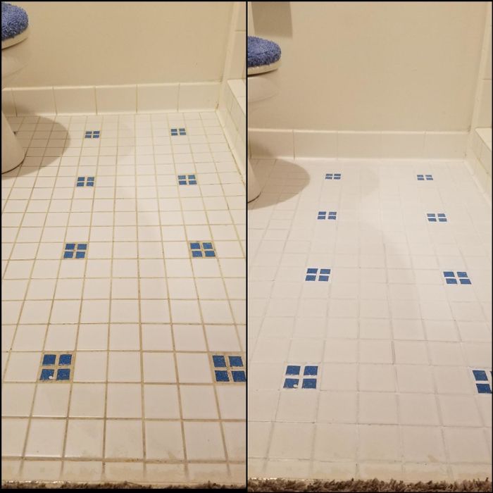 a reviewer's before-and-after photo of their white and blue tiles, with the grout transforming from dull and dirty to pristine white