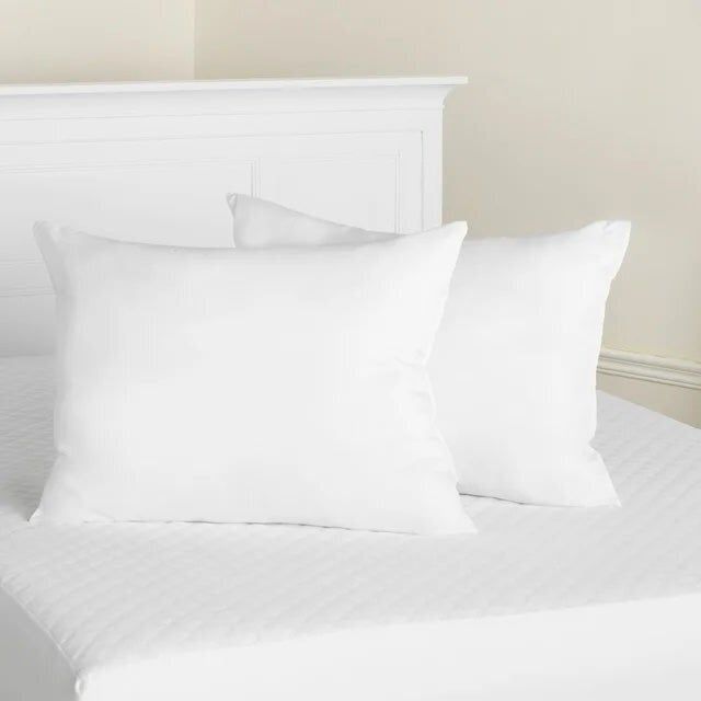 White firm support pillows