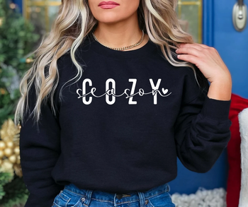 A model showcasing the sweatshirt in black with white lettering