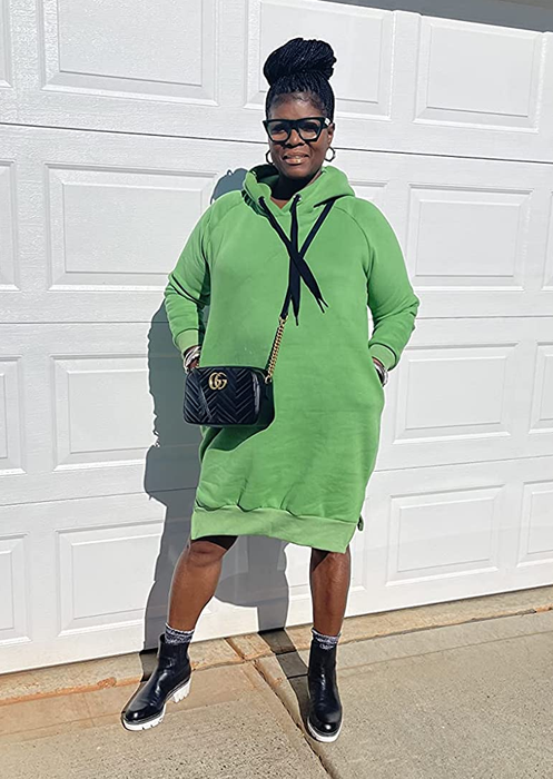 Another reviewer showcasing the green dress
