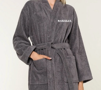 A model donning the robe in gray with the name