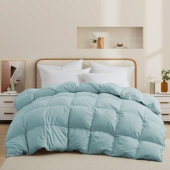 A cozy comforter in a rich shade of blue