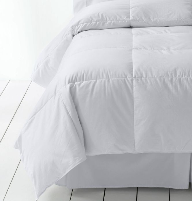 Comforter placed on bed