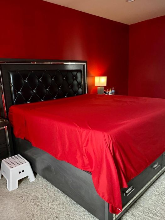 Photo of red sheets shared by a reviewer