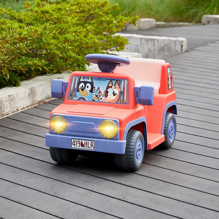 A toy vehicle designed like a car from