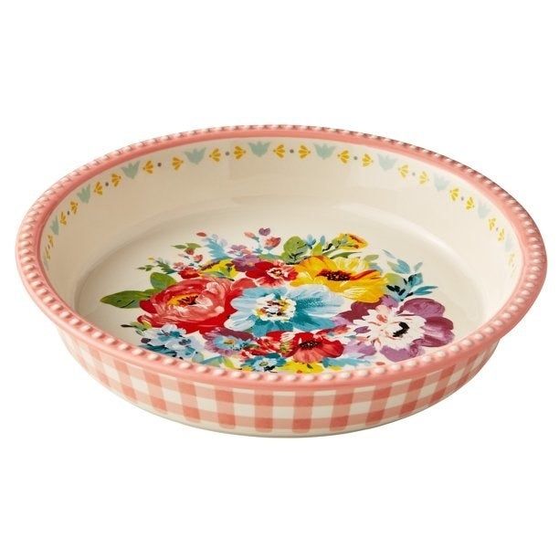 The empty dish showcasing a vibrant floral pattern at the bottom.