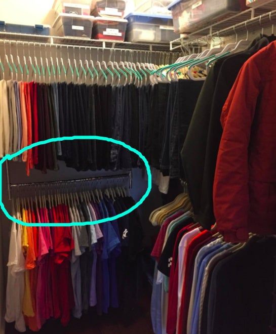 A customer's photo of the Simple Houseware adjustable chrome closet rod installed in their closet