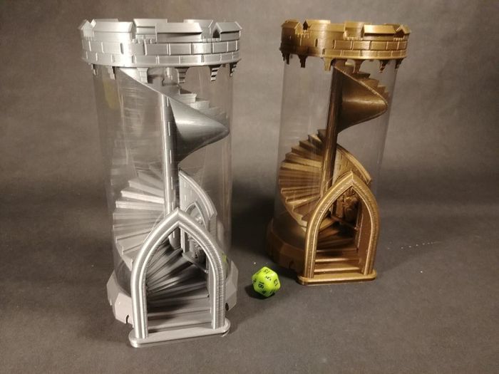 two transparent tubes with a spiral design inside, allowing you to roll your dice down a staircase-like path