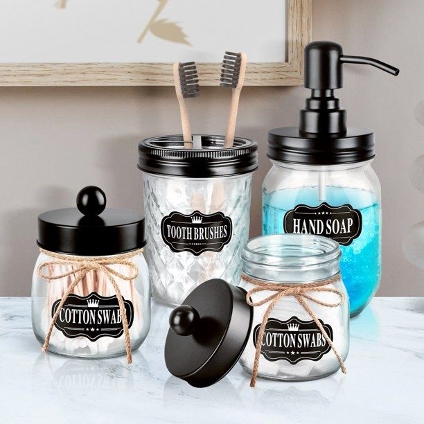 The four bathroom accessories arranged on the counter, ready for use.